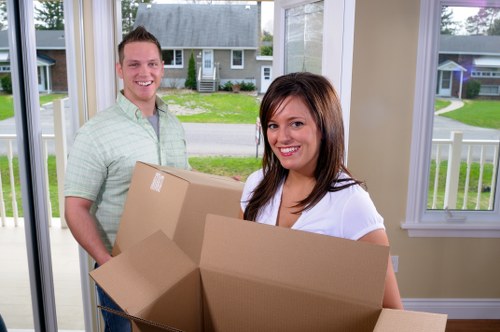 Home moving van and packed boxes ready for a Collierswood relocation