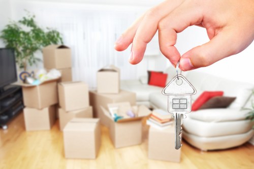 House movers helping a Colliers Wood home move with boxes and furniture