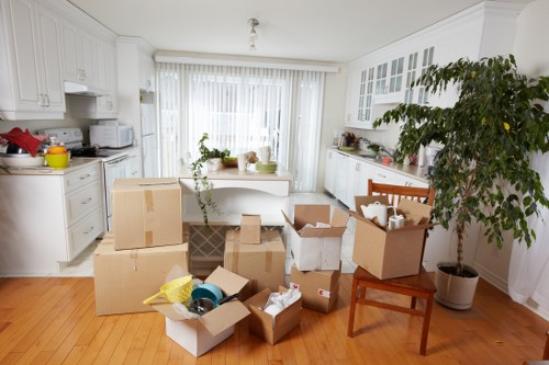 Man and van removals team loading furniture in Collierswood