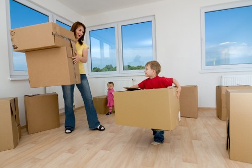 Careful loading of boxes and furniture for a flat move in Collierswood