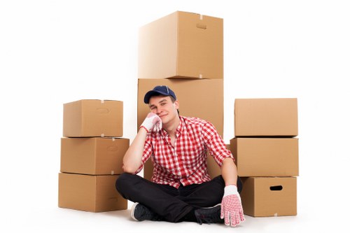 Removal team handling furniture and boxes during a local move
